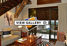 Lounge and Deck of the Waterhole Facing Suite at Victoria Falls Safari Lodge