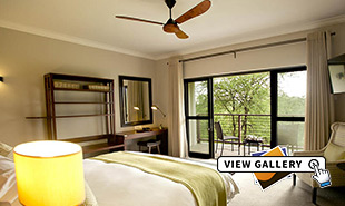 View of bedroom (Deluxe room) and balcony at Ilala Lodge Hotel