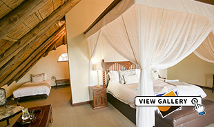 View of bedroom (Standard Suite) and 4 poster bed at Ilala Lodge Hotel