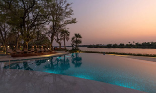 Swimming pool next to the Zambezi river. evening